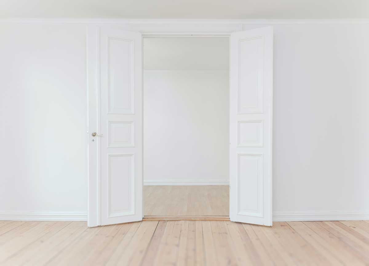 empty new home - white, open doors, white walls